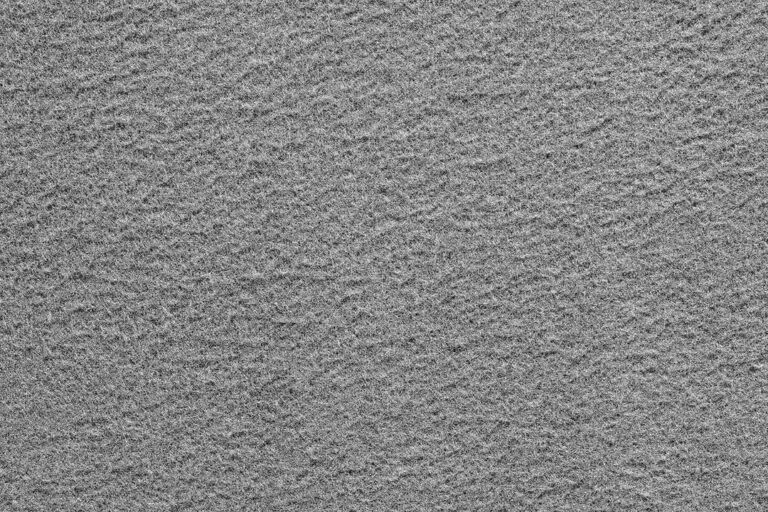 Texture Of Fleecy Fabric Of An Abstract Background Of Gray Color